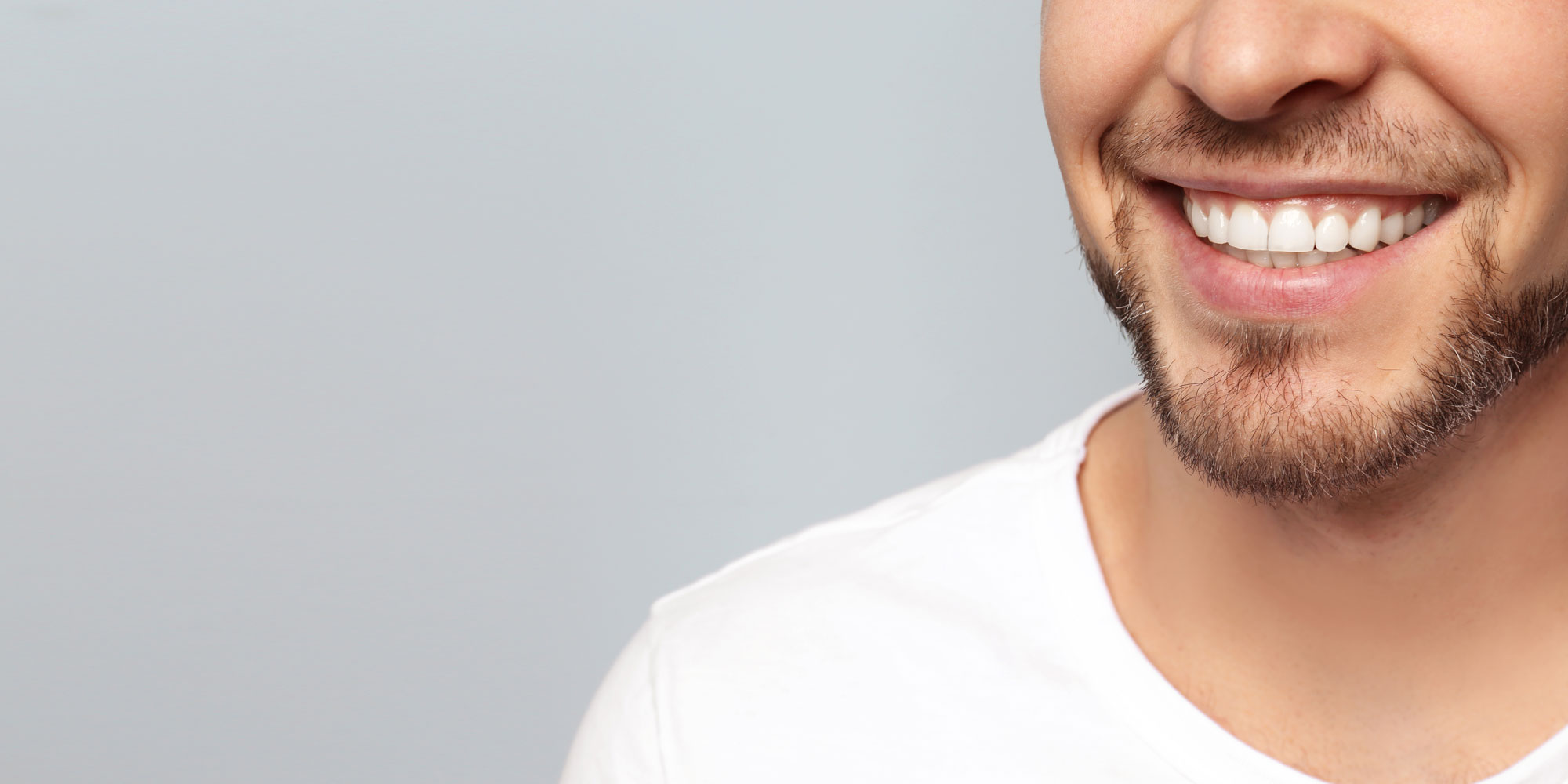 dental patient smiling after periodontal treatment