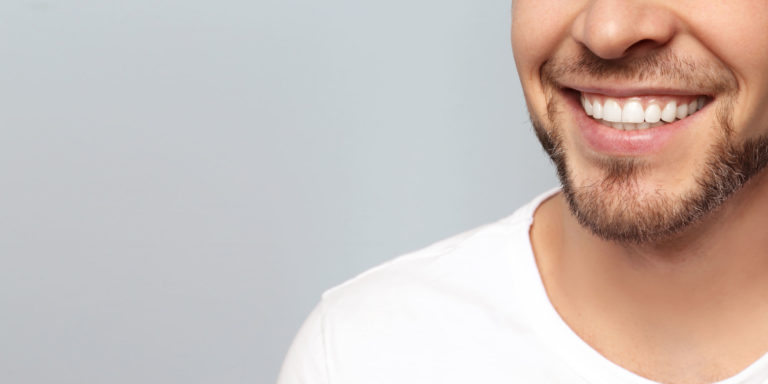 dental patient smiling after gum disease treatment