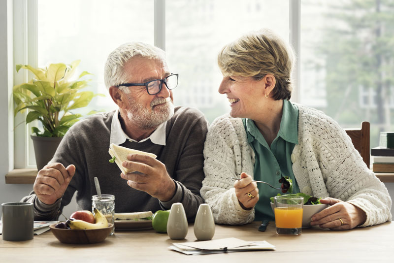 Dental Implant Patients Eating Together In Monroe, CT